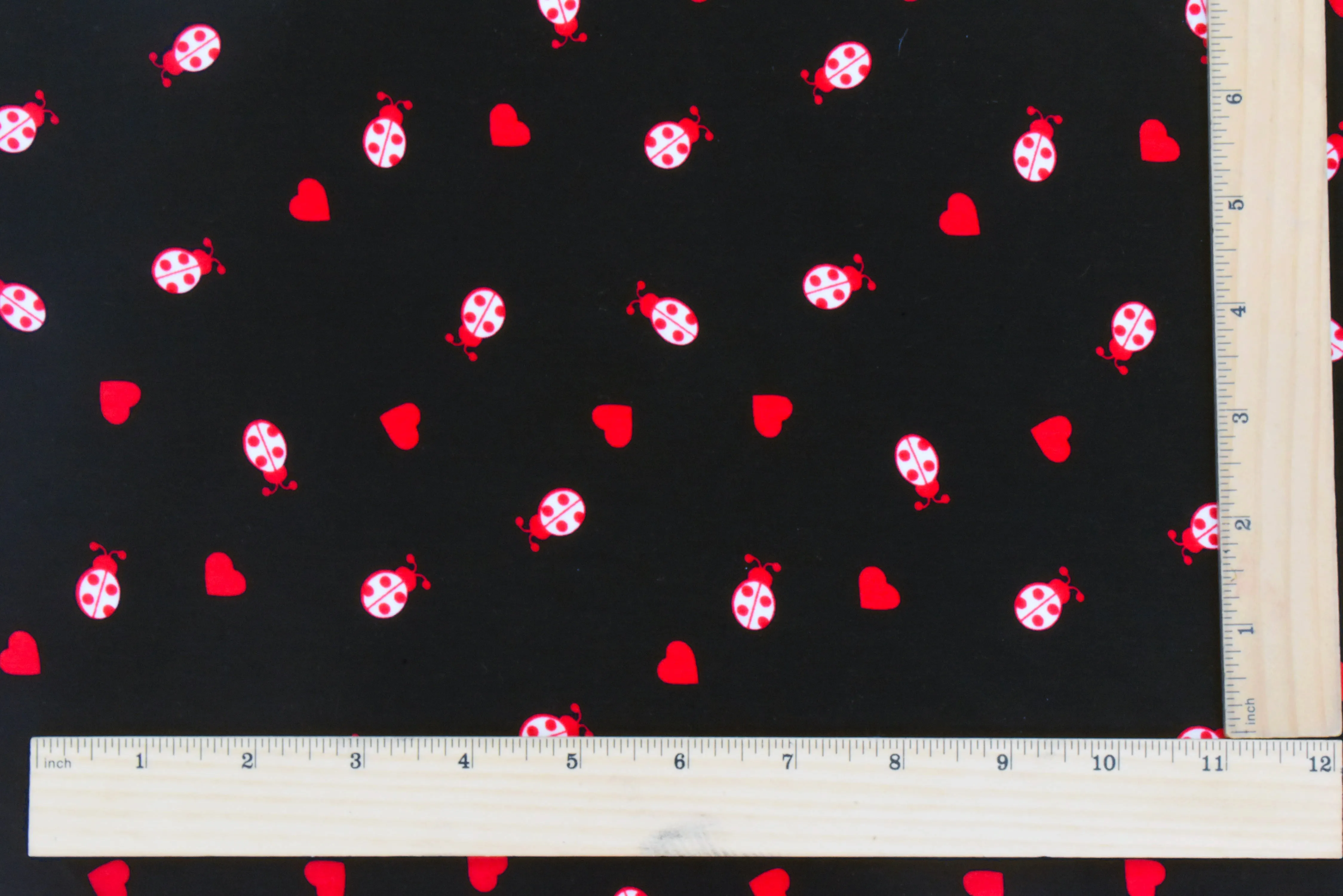 Red-Black-White Love Bug Printed Faille Fabric